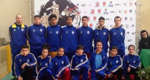 integrantes da equipe de kung fu de barueri posam para foto