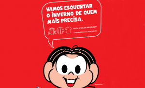 uma imagem da Mônica, da Turma da Mônica, convidando o leitor a esquentar o inverno de quem mais precisa