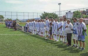 Equipes do Nacional e do Nei Sports/CASA perfilados para o hino